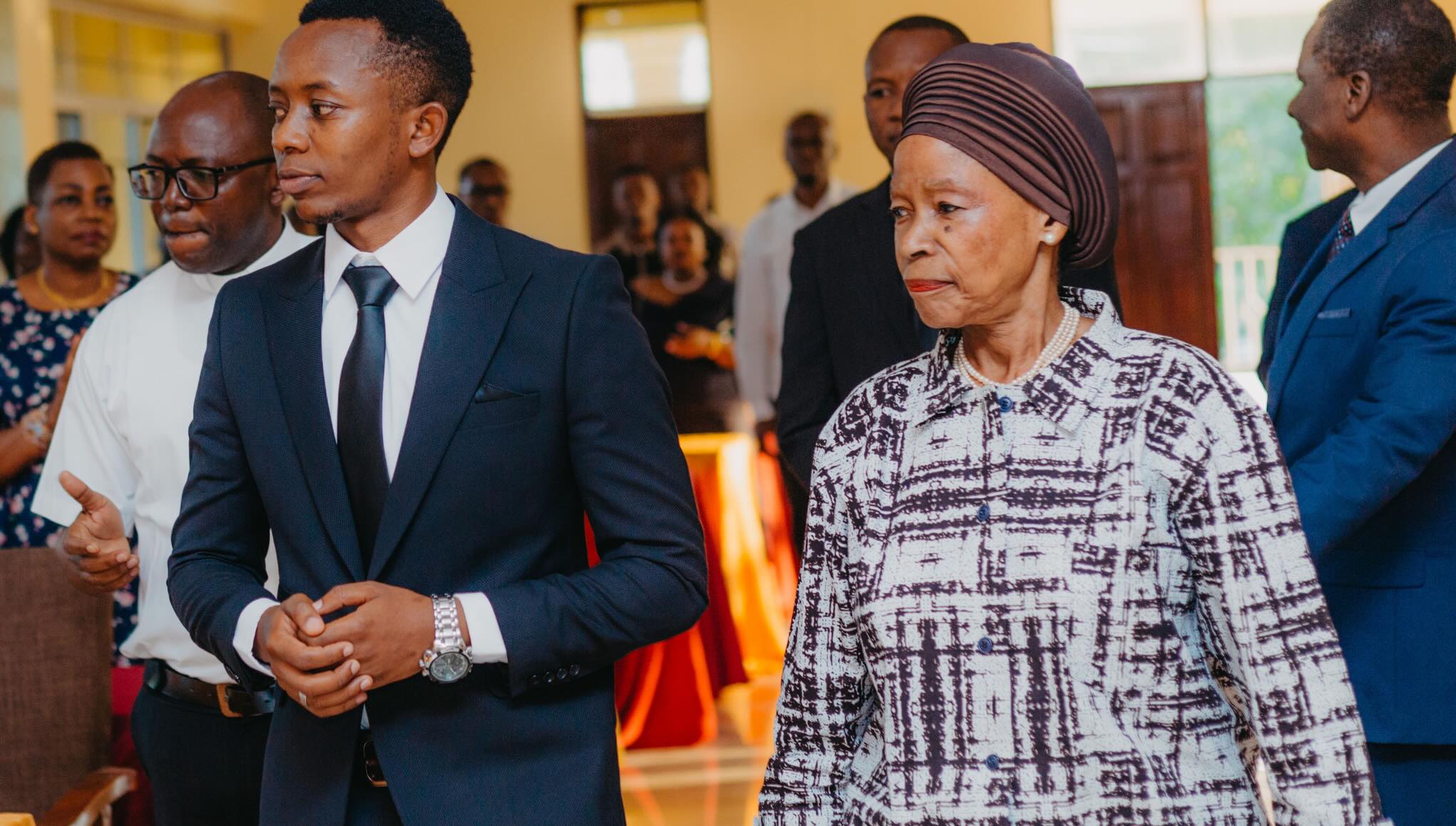 Walking in with the guest of honour.