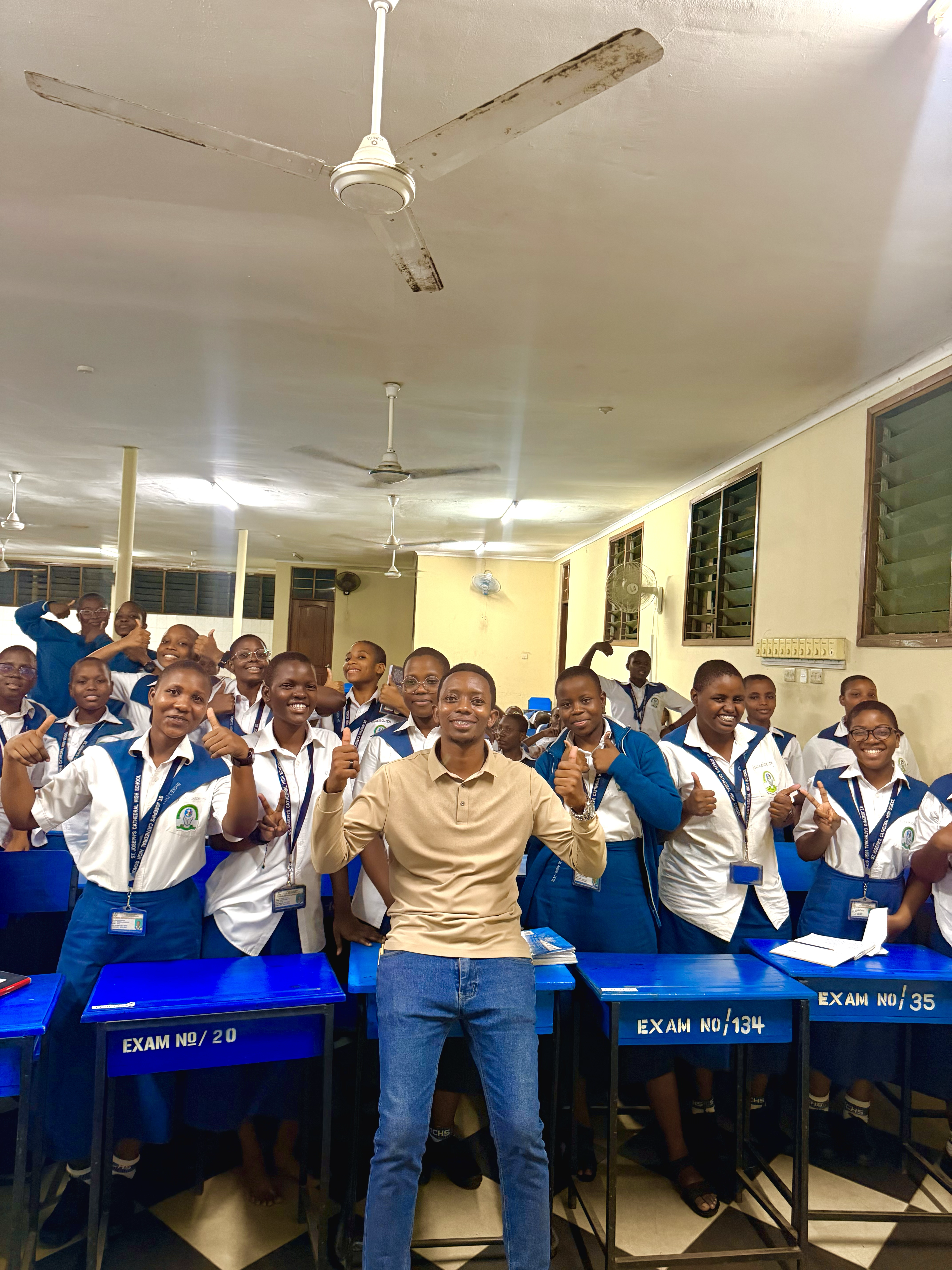 Aman Lyimo with students at St Joseph Cathedral High School before their examinations